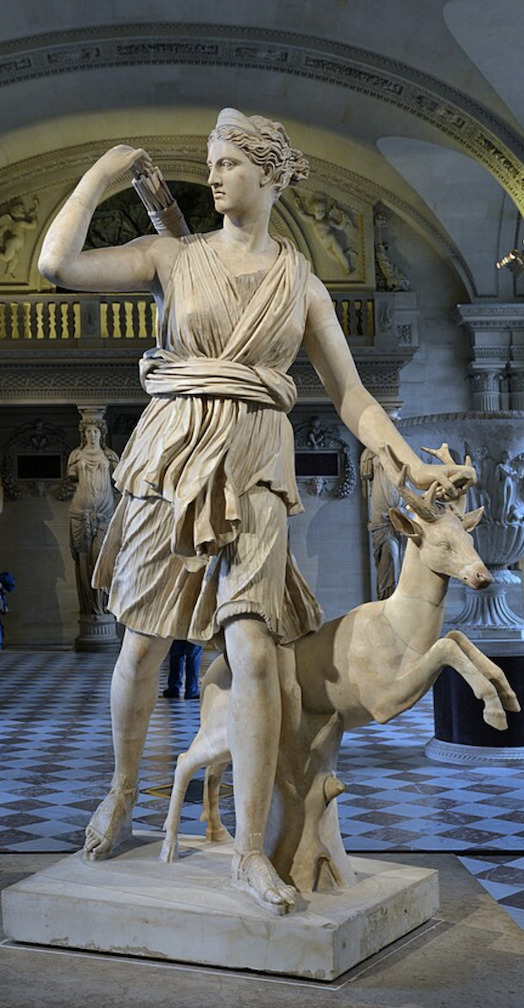 Photograph of the Diana of Versailles sculpture, depicting Diana, the Roman goddess, in a dynamic pose with a deer, symbolizing her role as the goddess of the hunt.
